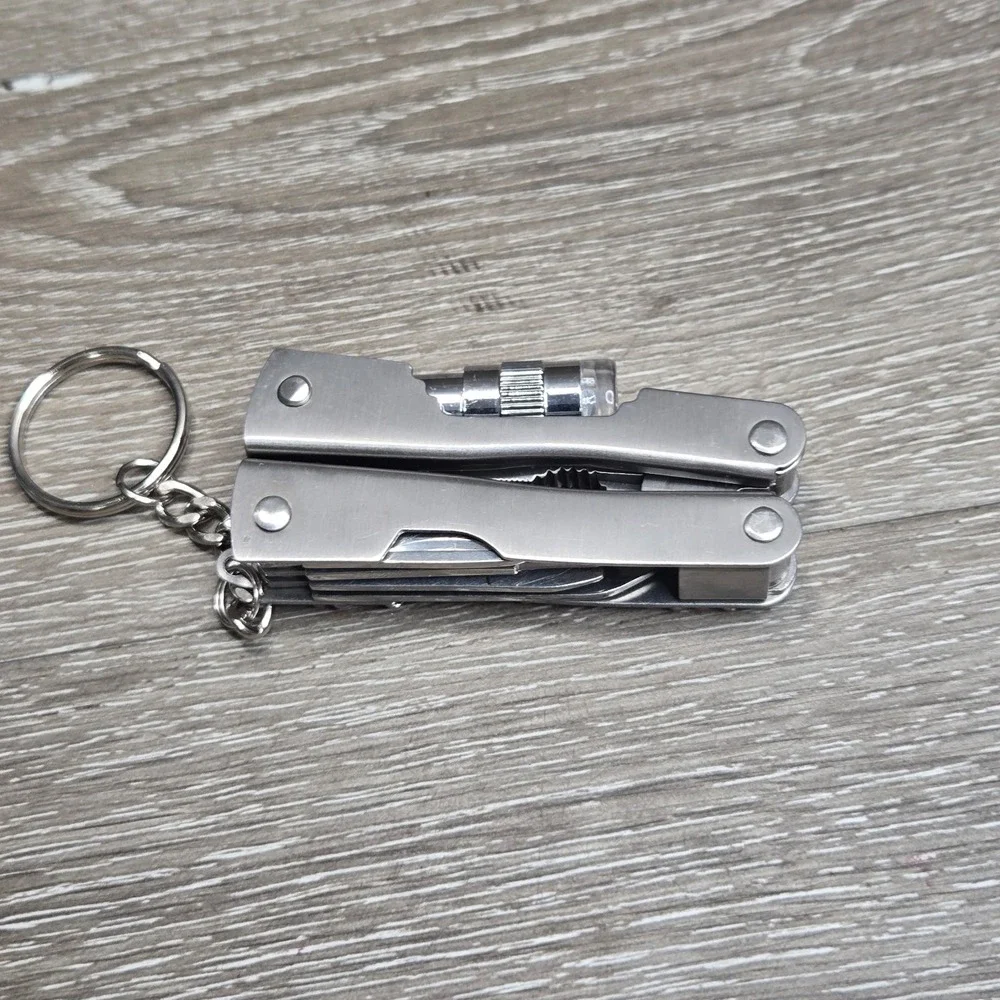 Vintage Avon Portable Bejeweled Multi-Tool With Light 2007 OB